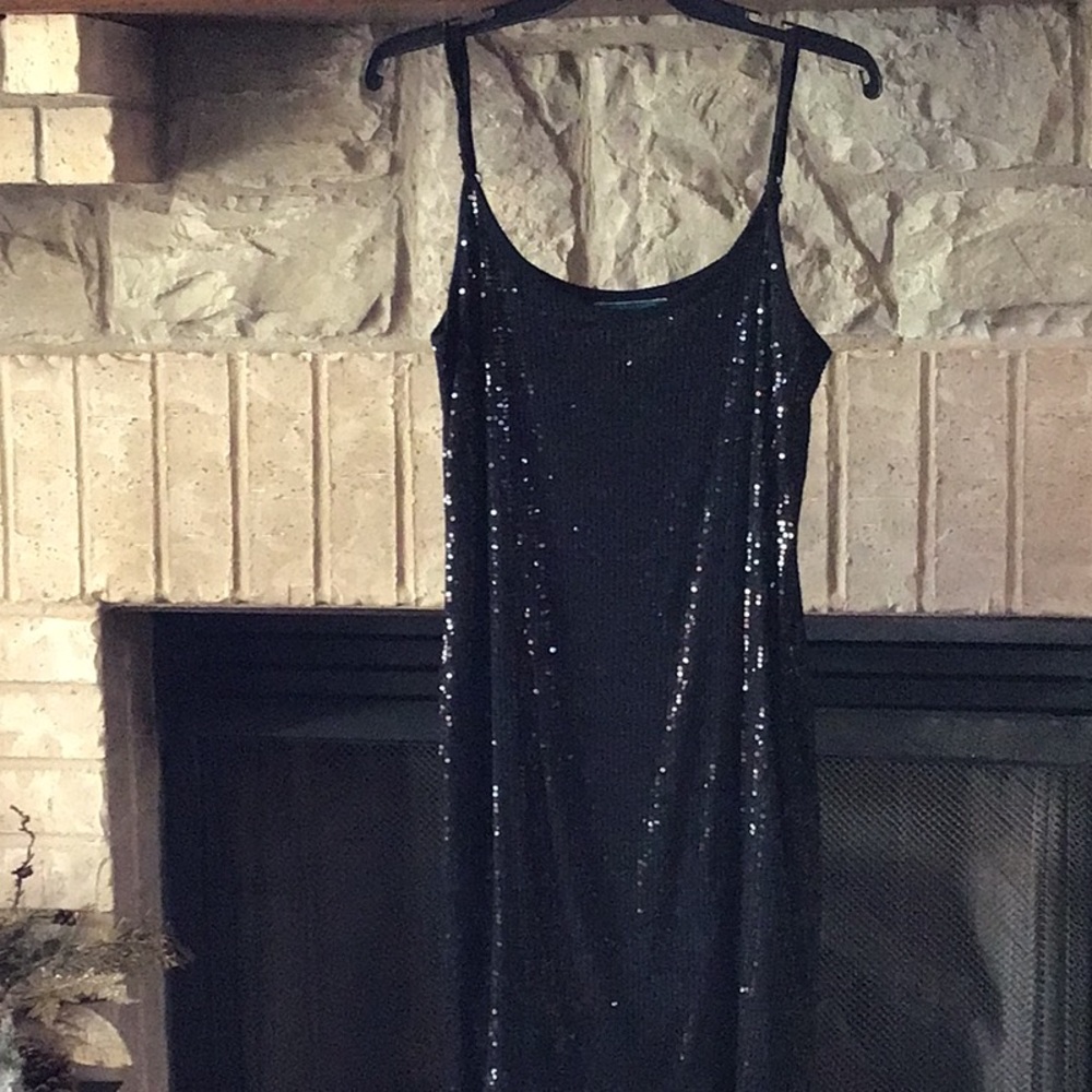 Black sequined slip dress.
